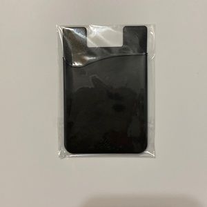 Never opened IPhone wallet holder